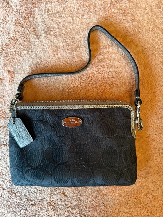 Coach Handbags - Coach Black Signature Wristlet with Silver Trim